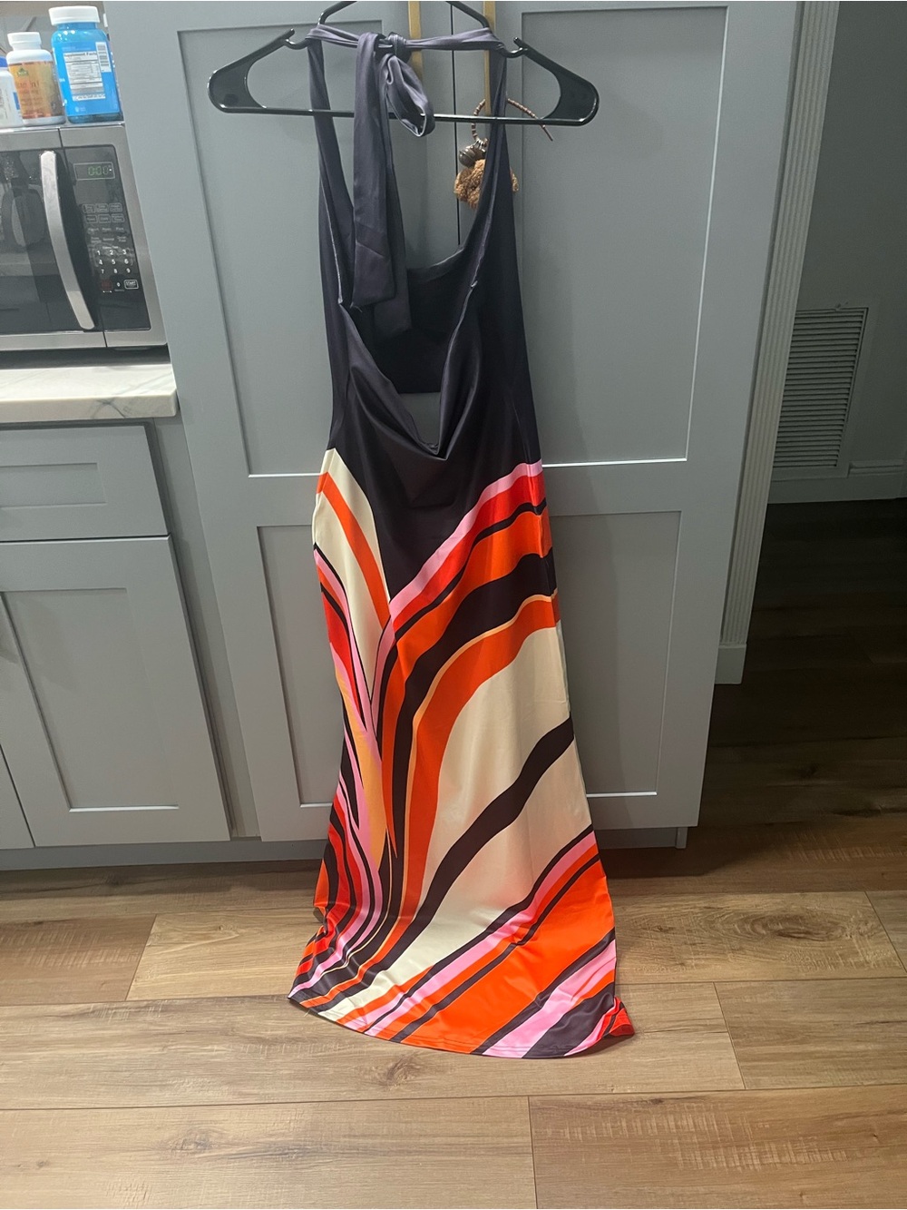 Women's Halter Maxi Dress in Black with Orange and Pink Wave Print